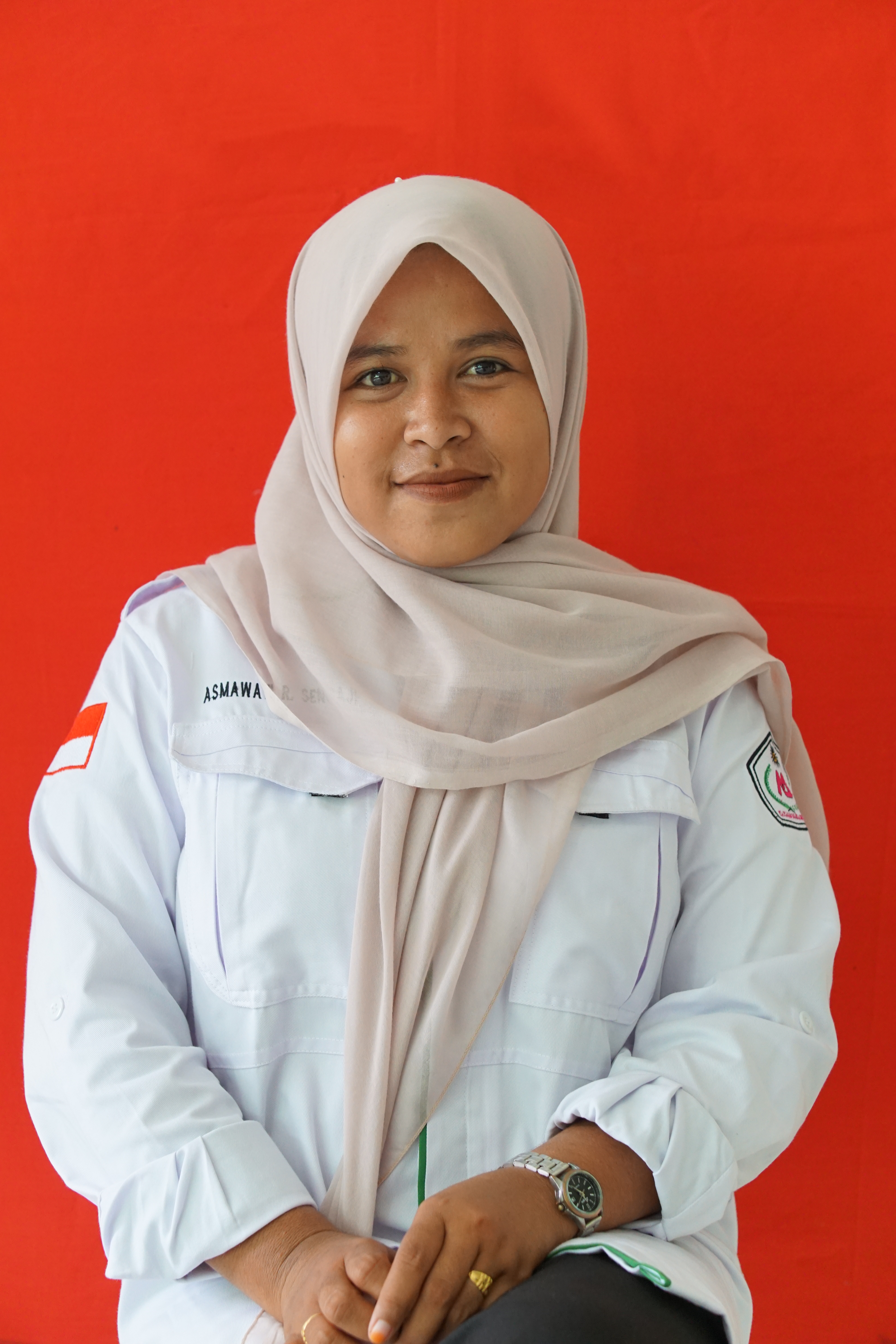 Asmawati Rahman Sengaji, S.Pd